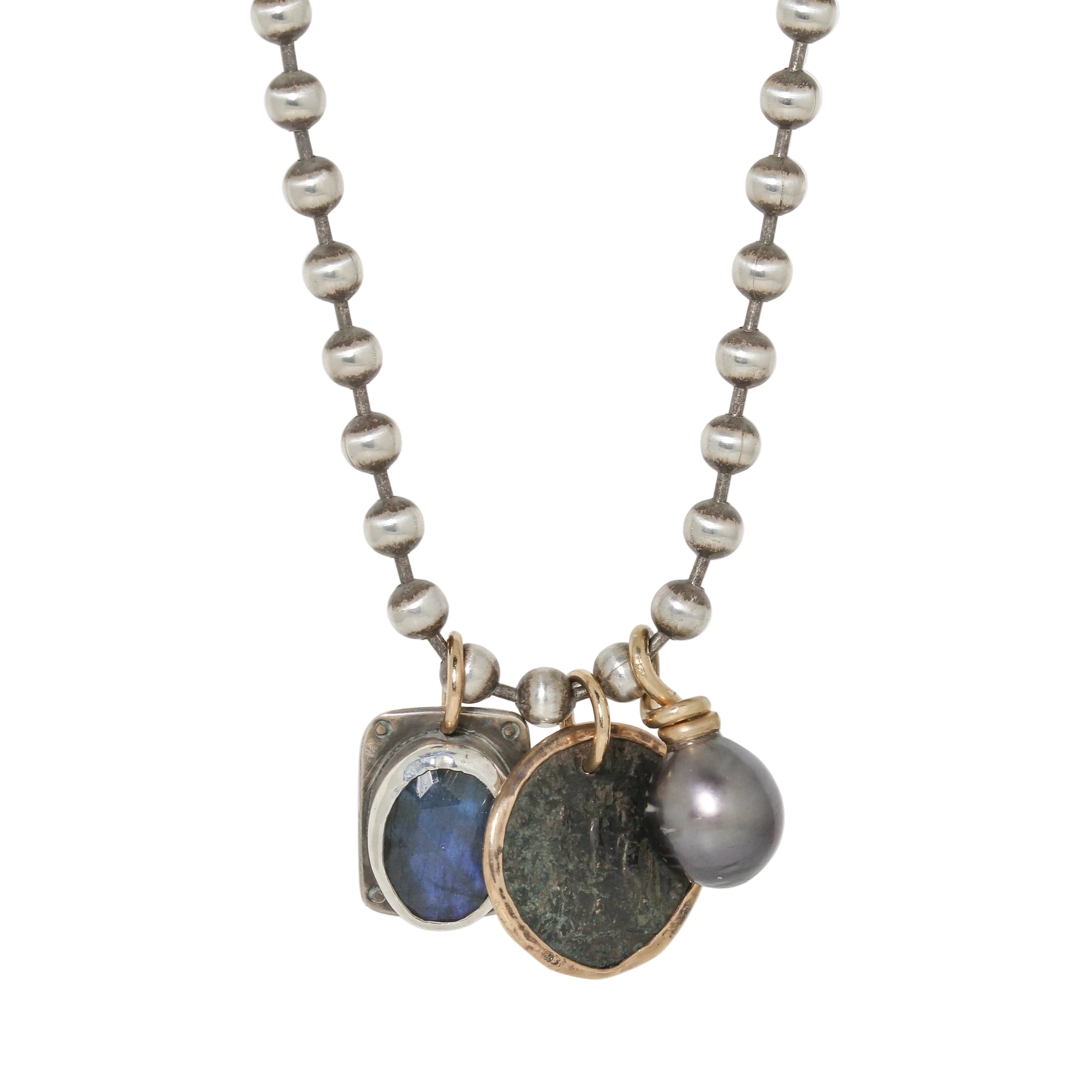 sterling chain and gold-filled accents this necklace features a Roman coin and Tahitian pearl and bezel set labradorite pendant by glacier lily
