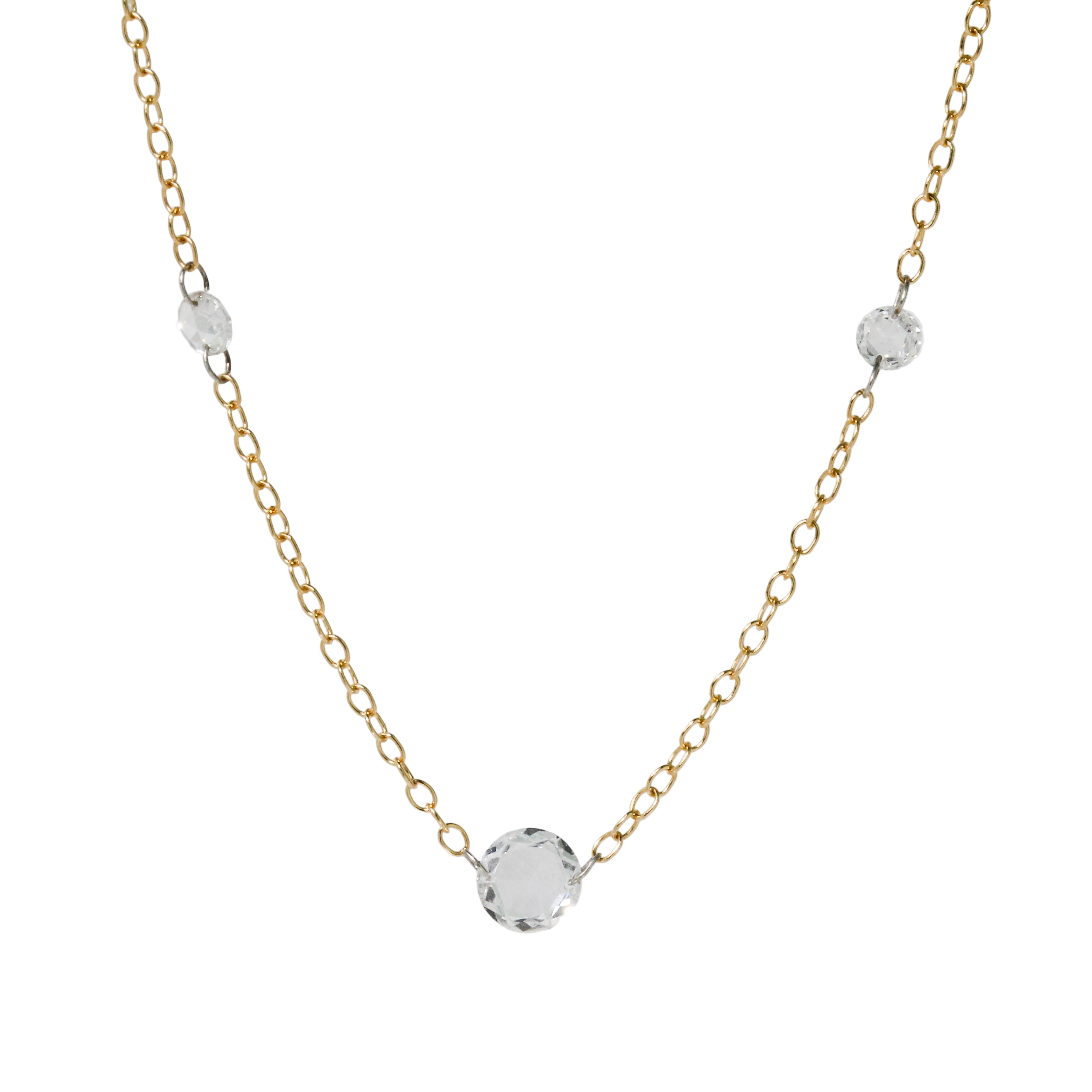 Gold chain necklace with clear diamonds on a white background
