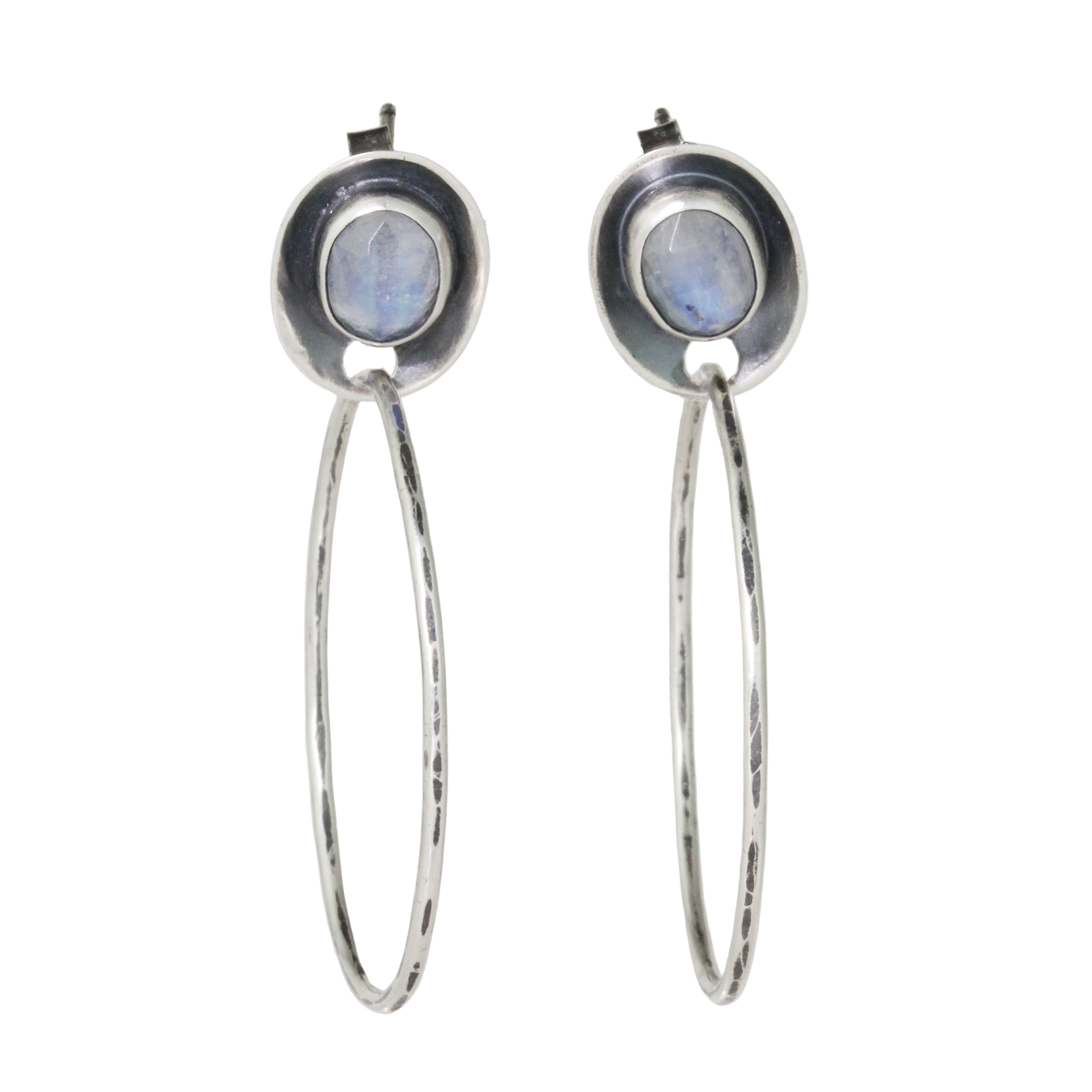 Pair of silver earrings with rainbow moonstones on a white background